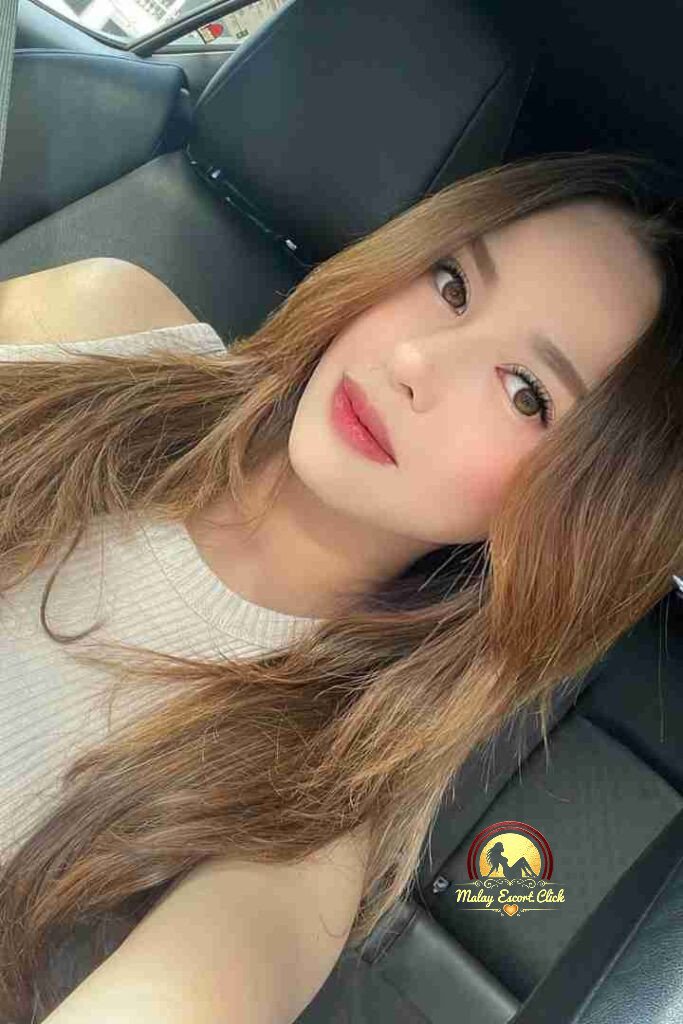 Malay Escort Girl Elegant woman in black dress holding a wine glass, Blog Home