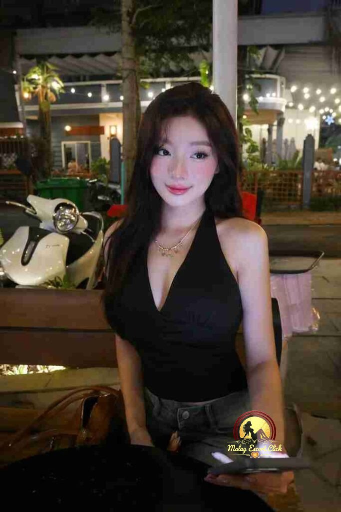 Ella, 24yo Vietnamese woman in black top, Kuala Lumpur escort.