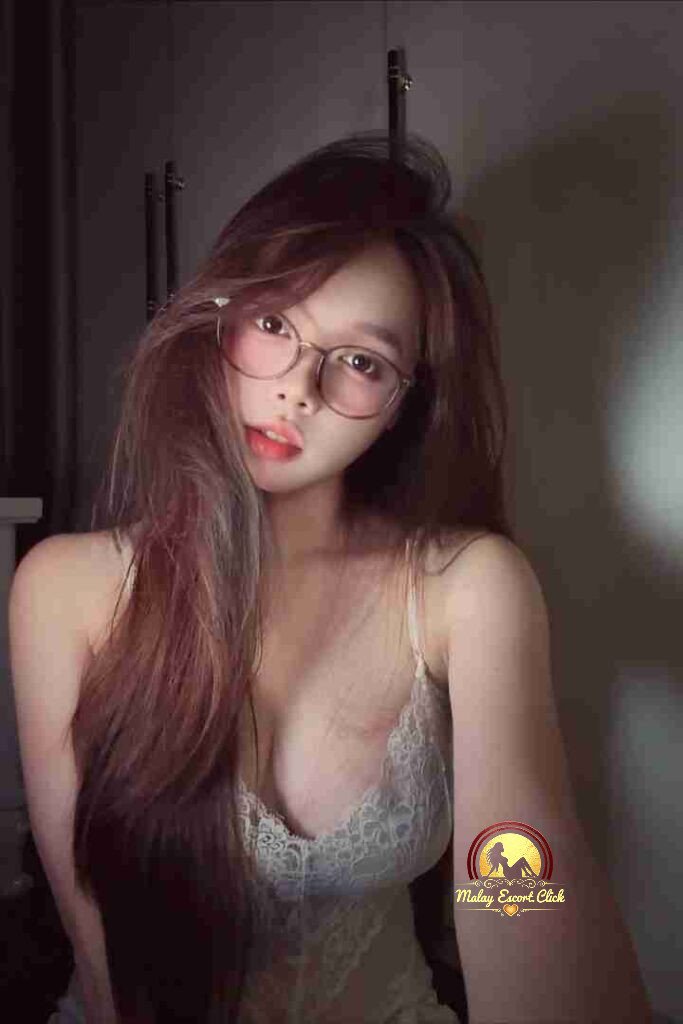 Beautiful Vietnamese woman with glasses and lingerie. C cup sophistication. Premium Mia.