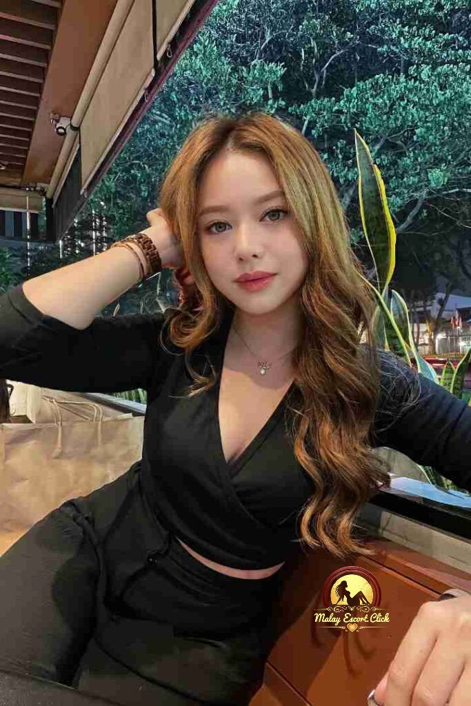 Malay Escort Girl Elegant woman in black dress holding a wine glass, Blog Home